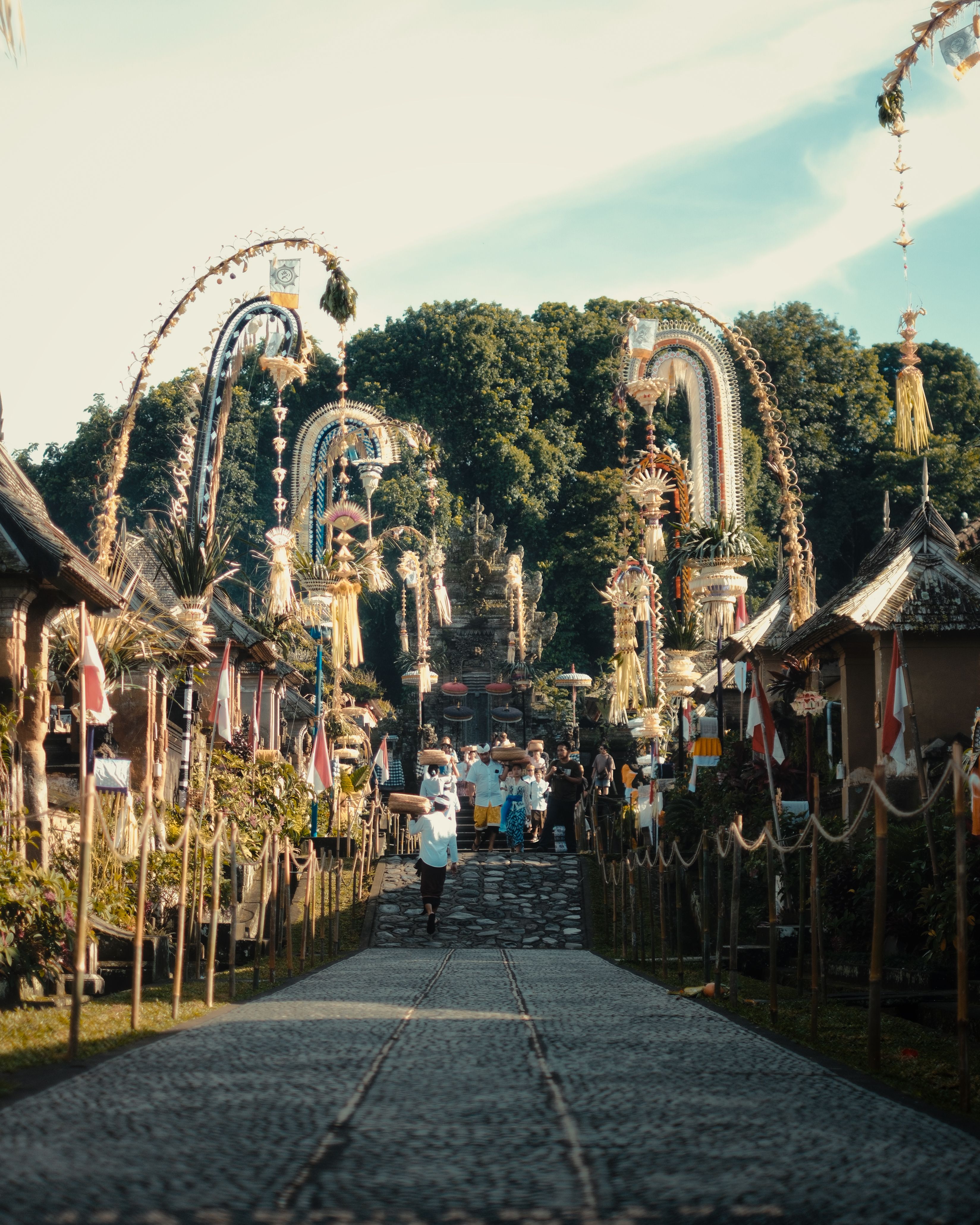 Traditional Balinese village compound with family temple and rice paddies