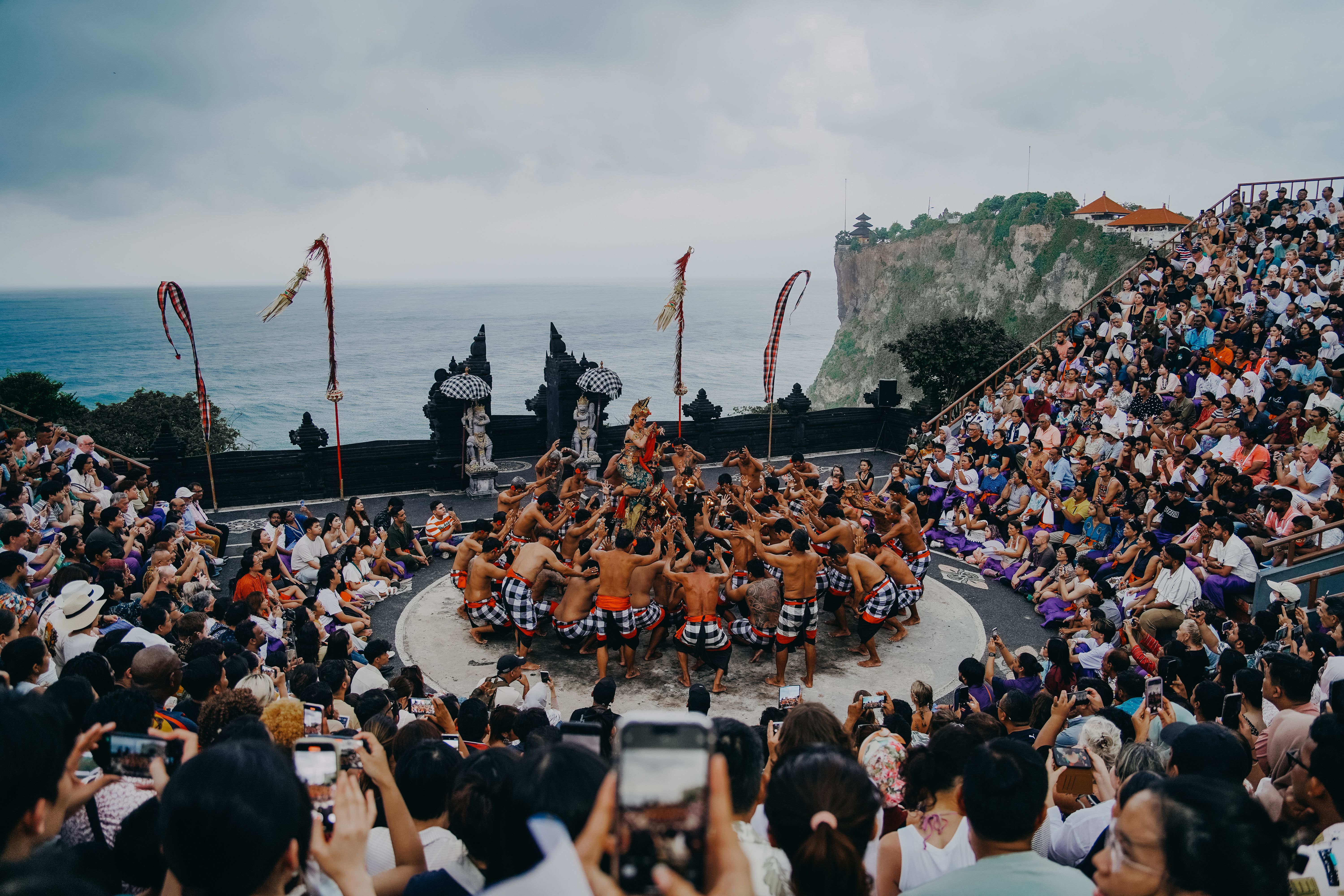 Kecak fire dance performance with the ocean backdrop